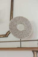 Cowries on base