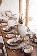 Set de table rond en rotin et coquillages