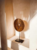 Disque d'ornement en métal ancien