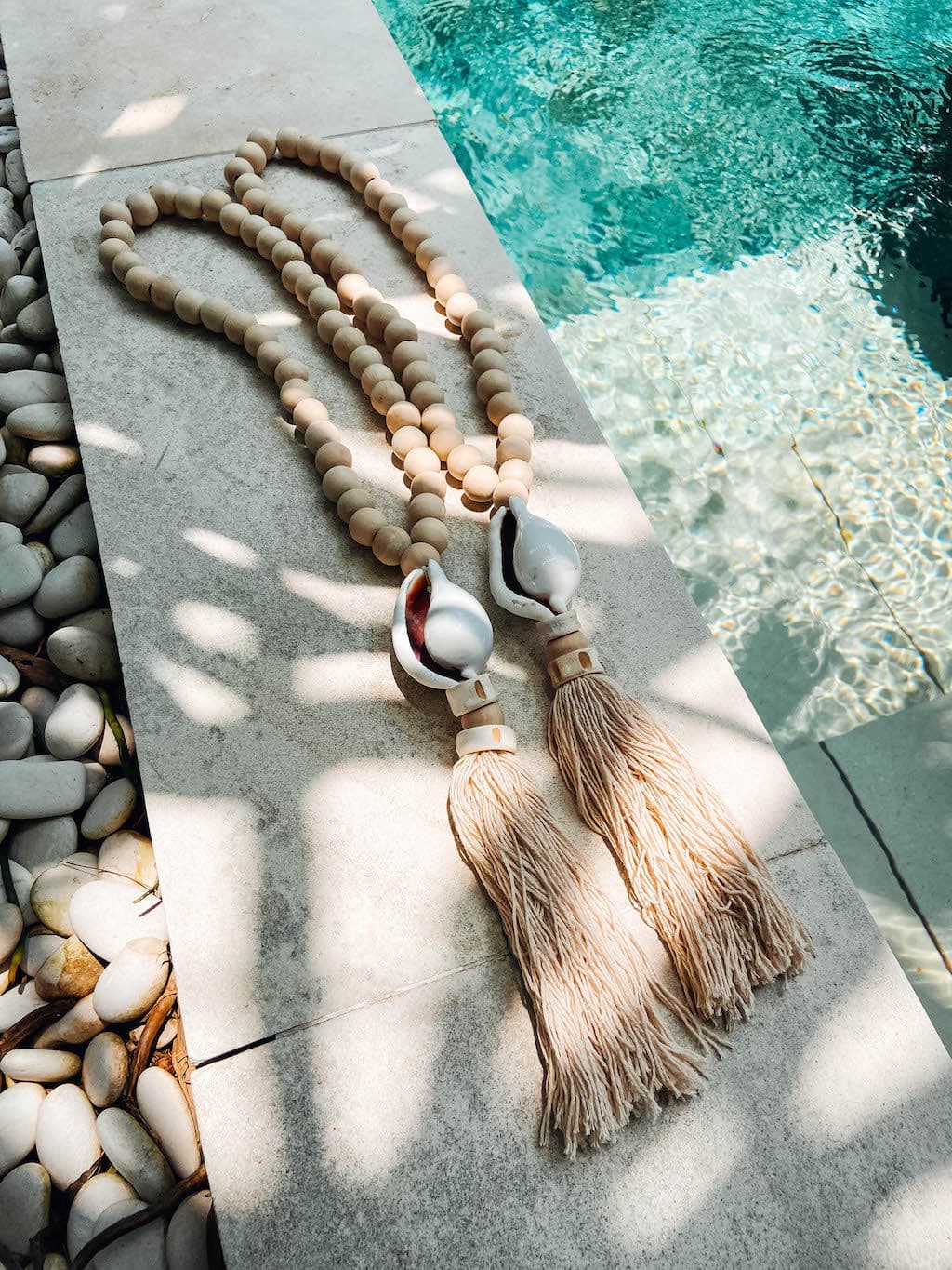 Large Balinese suspension in wooden beads and shell