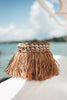 Bohemian basket with raffia fringes and shells