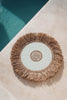 Sun wall decoration in pearls and raffia
