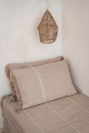 Housse de coussin en lin naturel à franges