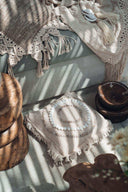 Housse de coussin Gili en coton et coquillages