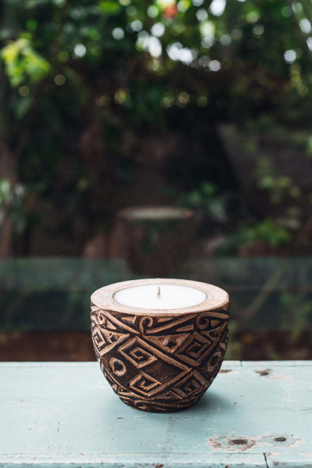 Balinese candle in carved wood