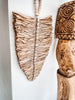 Decorative sheet in raffia and shells
